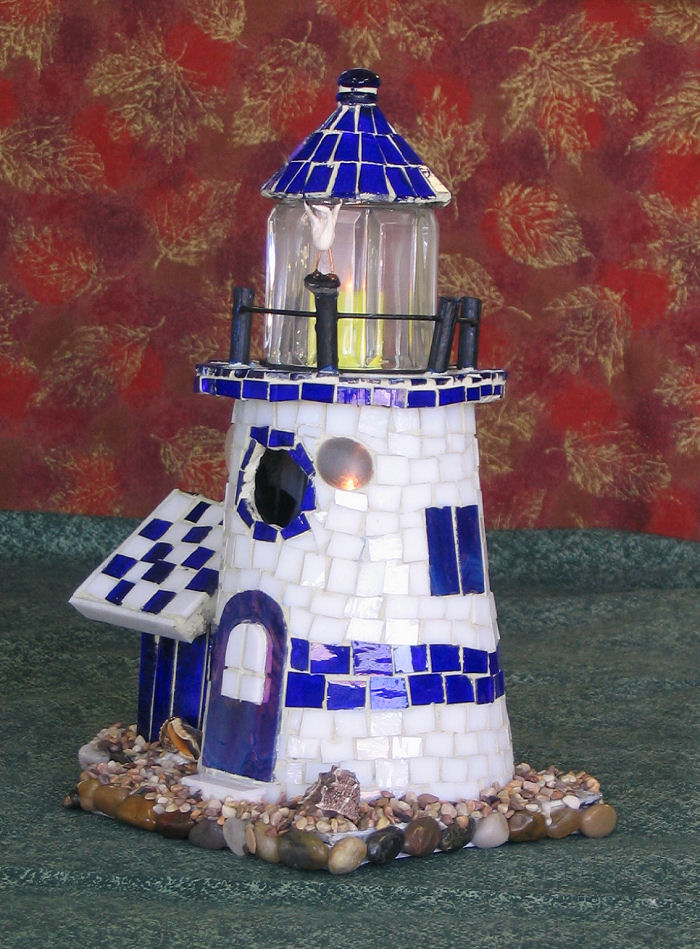 Second Place -- Lighthouse Bird Retreat by Lori Emery